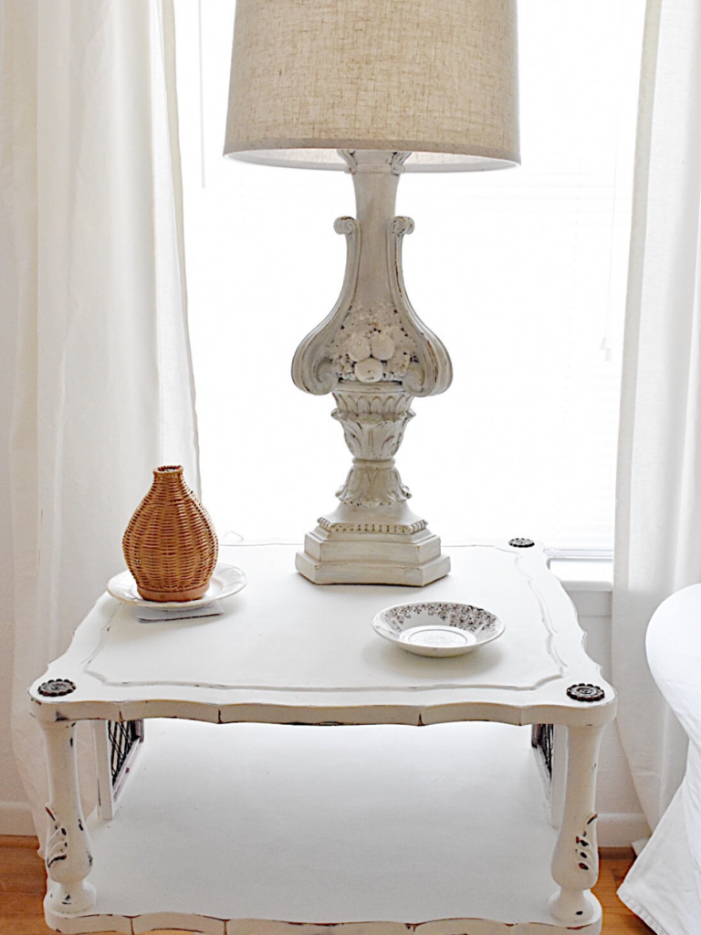 white square side table with lamp coaster diffuser beside couch