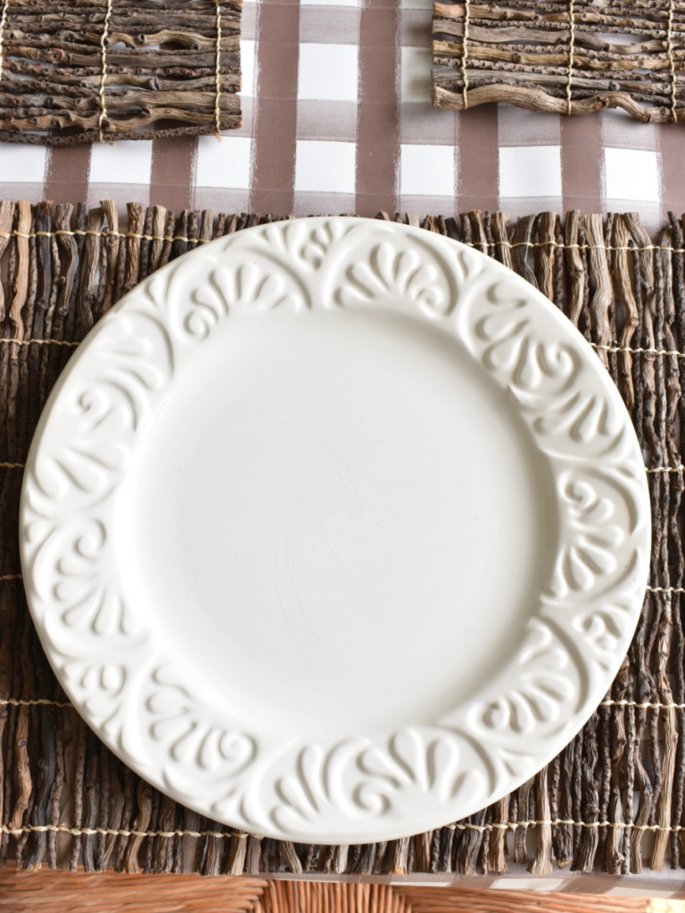 twig placemat with a large white dinner plate