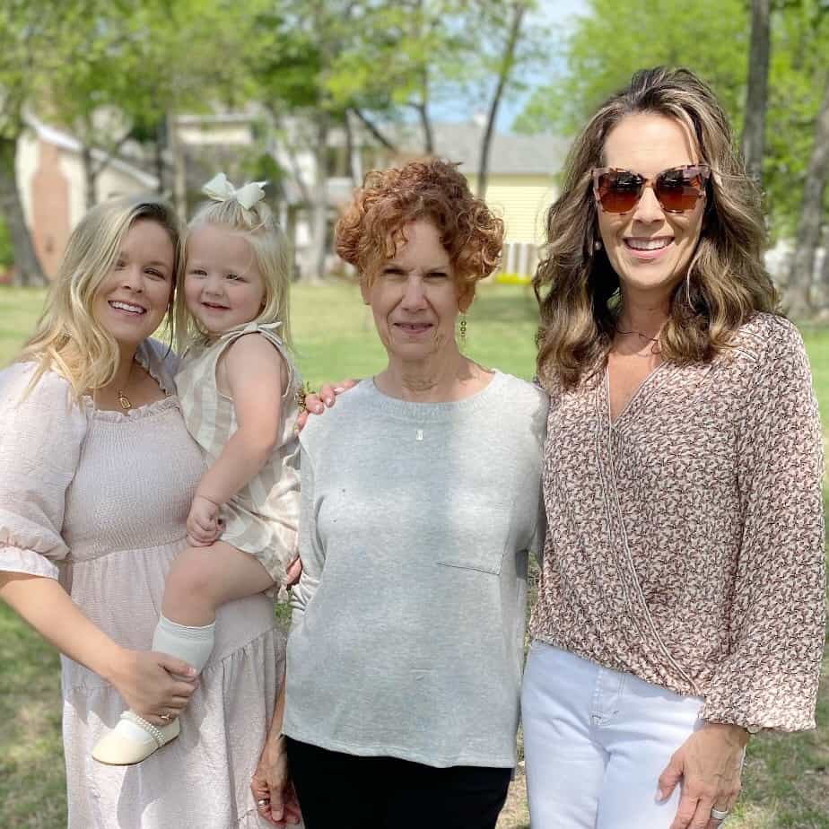 4 generations of women standing outside 