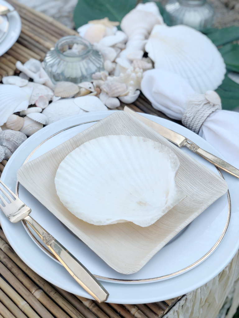 https://www.vintagehomedesigns.com/wp-content/uploads/2022/06/elegant-hawaiian-luau-party-place-settings-1-768x1024.png