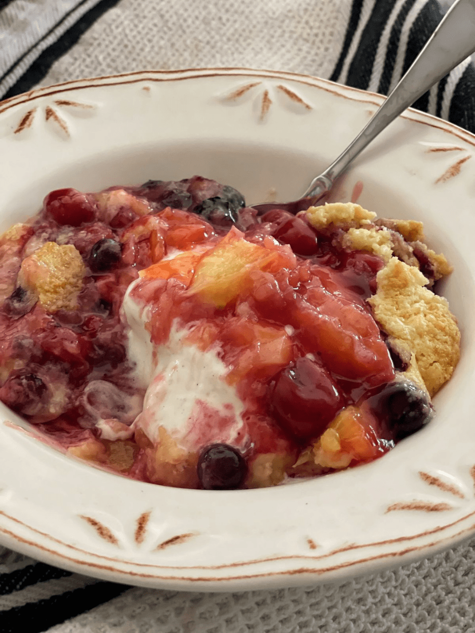 white bowl of pineapple dump cake