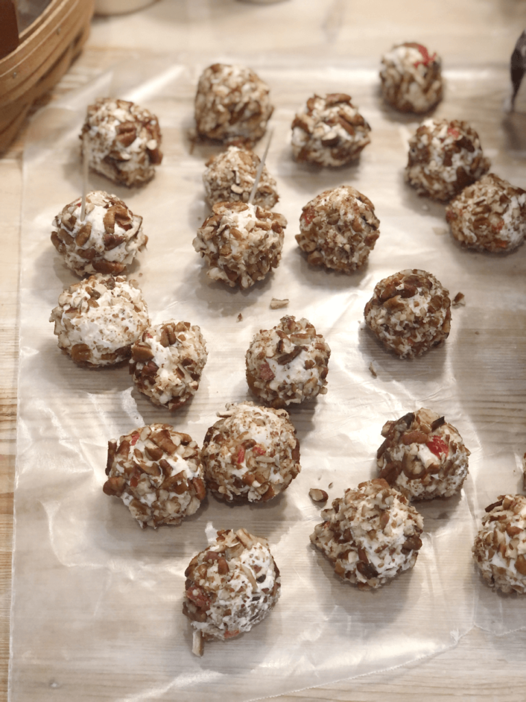 mini cheese balls on cutting board