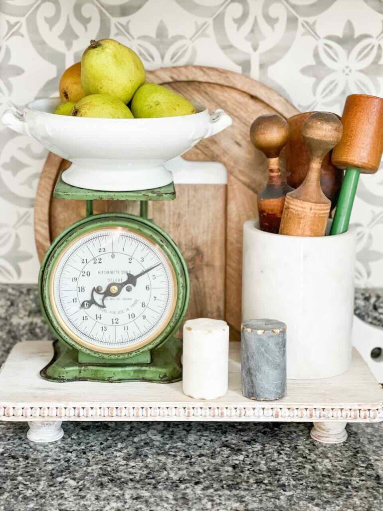 kitchen vignette green vintage scales white crock with rolling pins