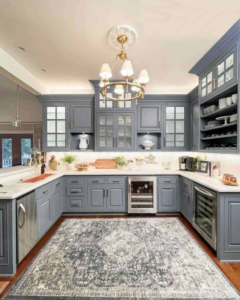 butler's pantry with dark gray cabinets and white countertop