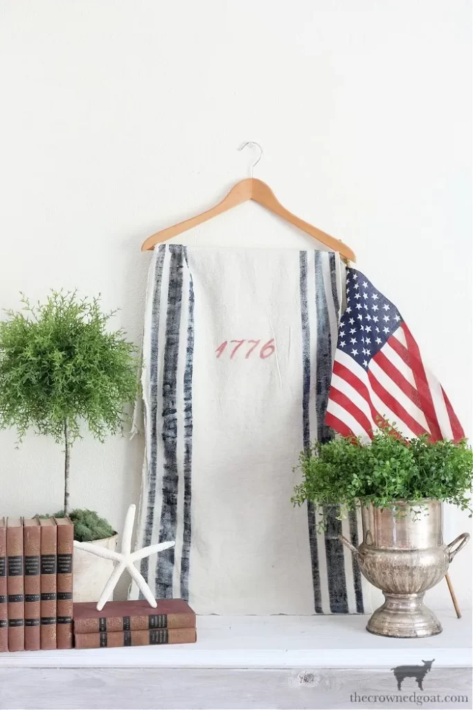 patriotic table runner made from grain sack blue side stripes and 1776 in red 