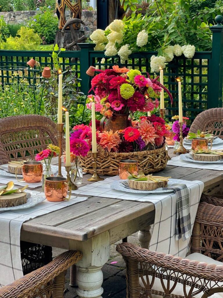 outdoor dinner party tablescape with bright florals