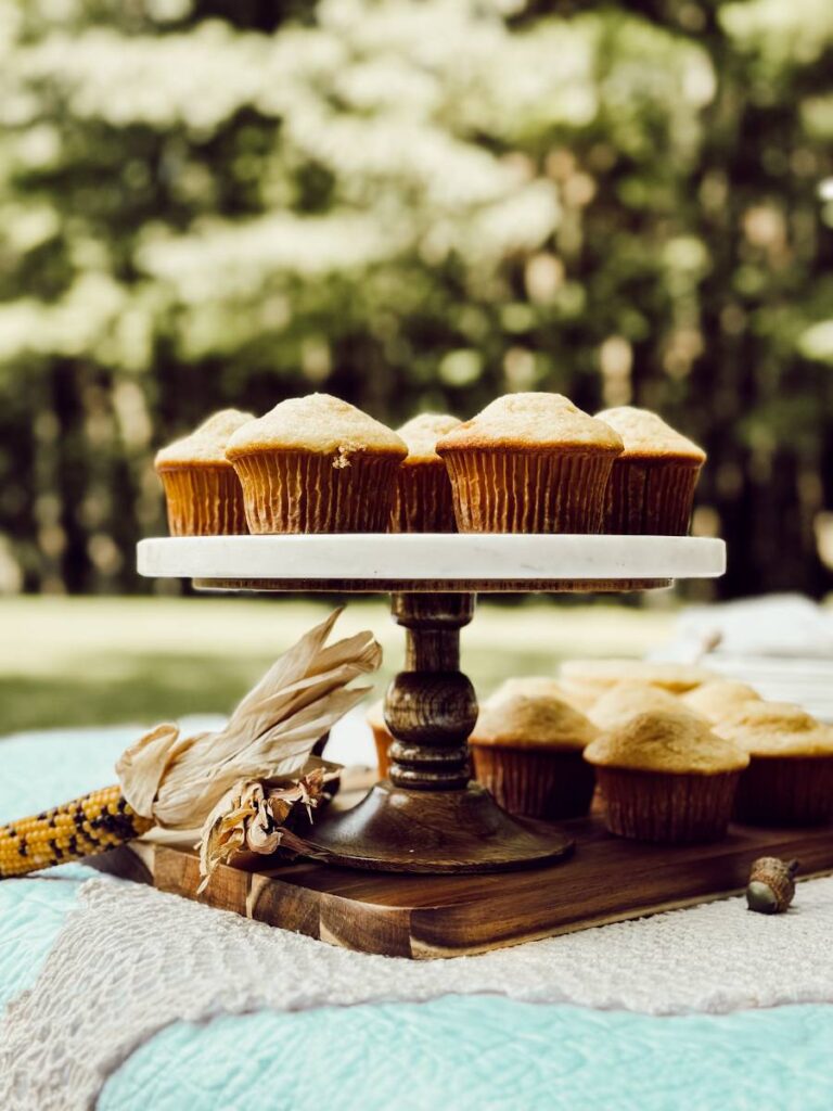 cake stand with corn bread muffins