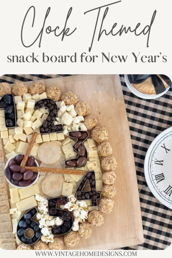 clock theme snack board with half clock face numbers white and dark foods pretzel clock hands