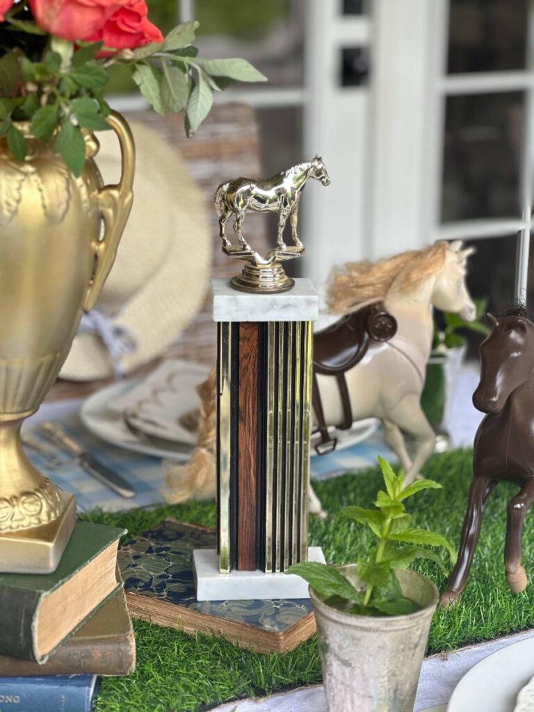 horse trophy in center of dinner table for Kentucky Derby table centerpiece