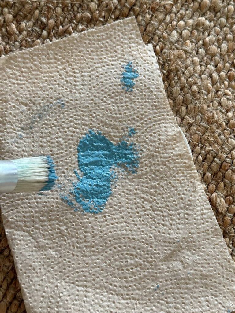 blue paint on stencil brush