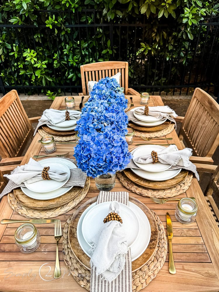 outdoor table set for a summer dinner party