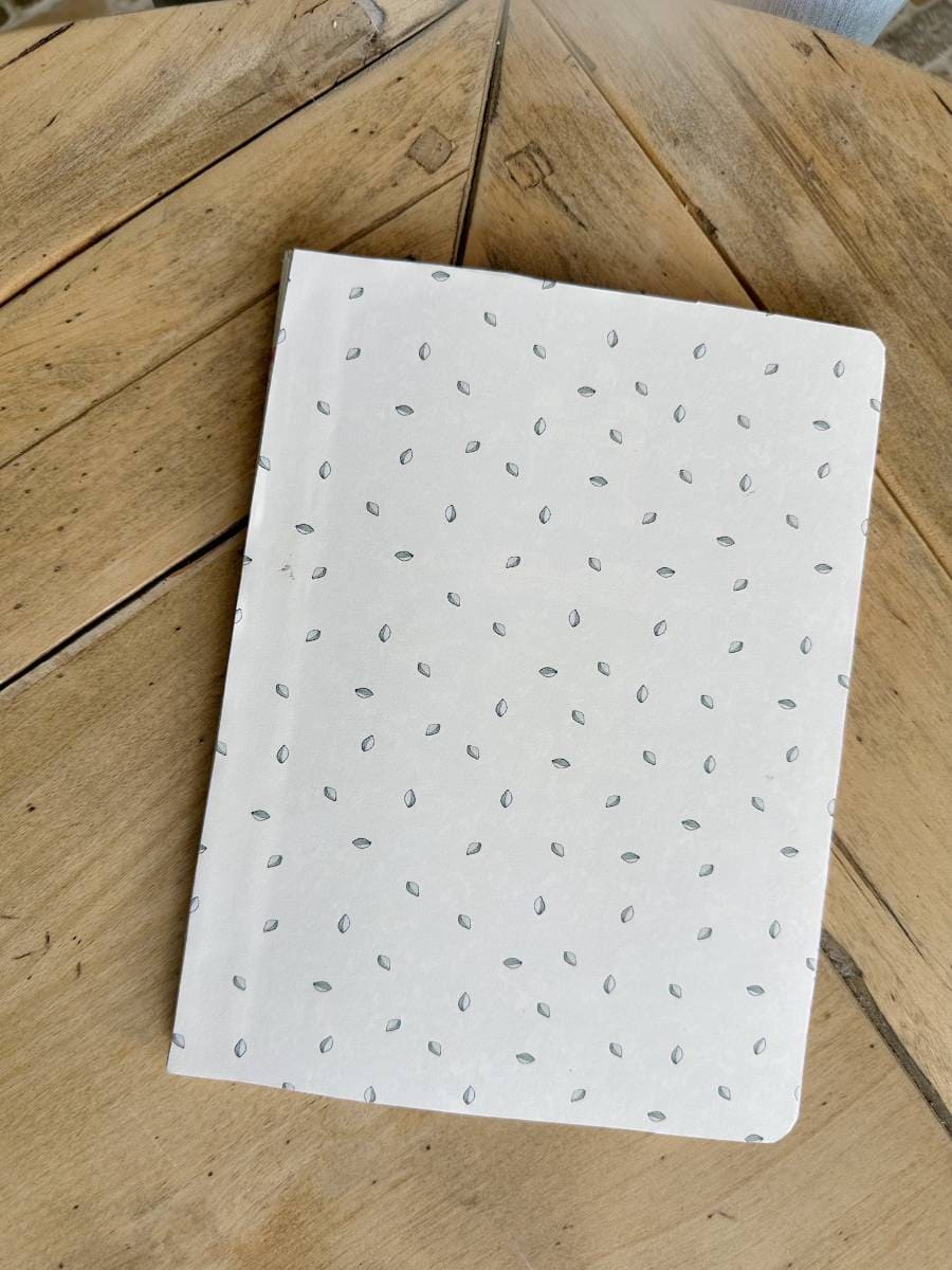 composition notebook covered with decorative paper