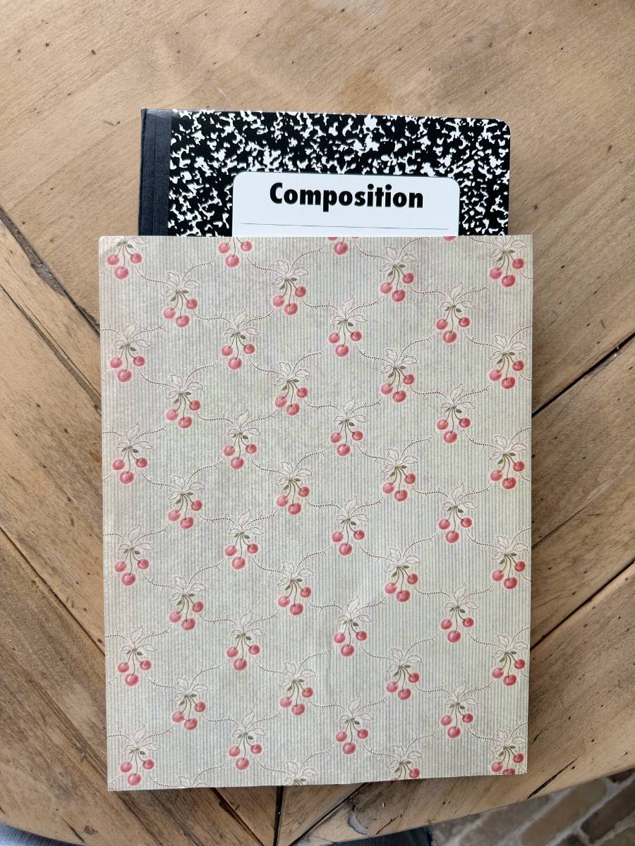 decorative paper and composition notebook for making personalized journal