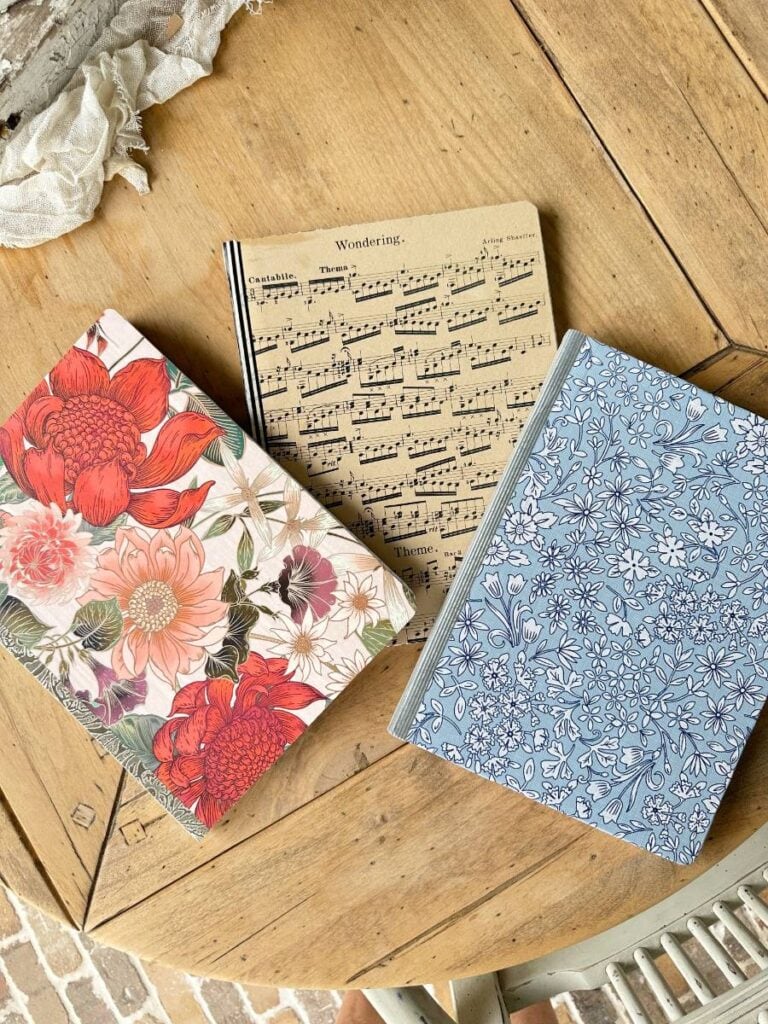 3 journal composition notebooks covered with decorative paper