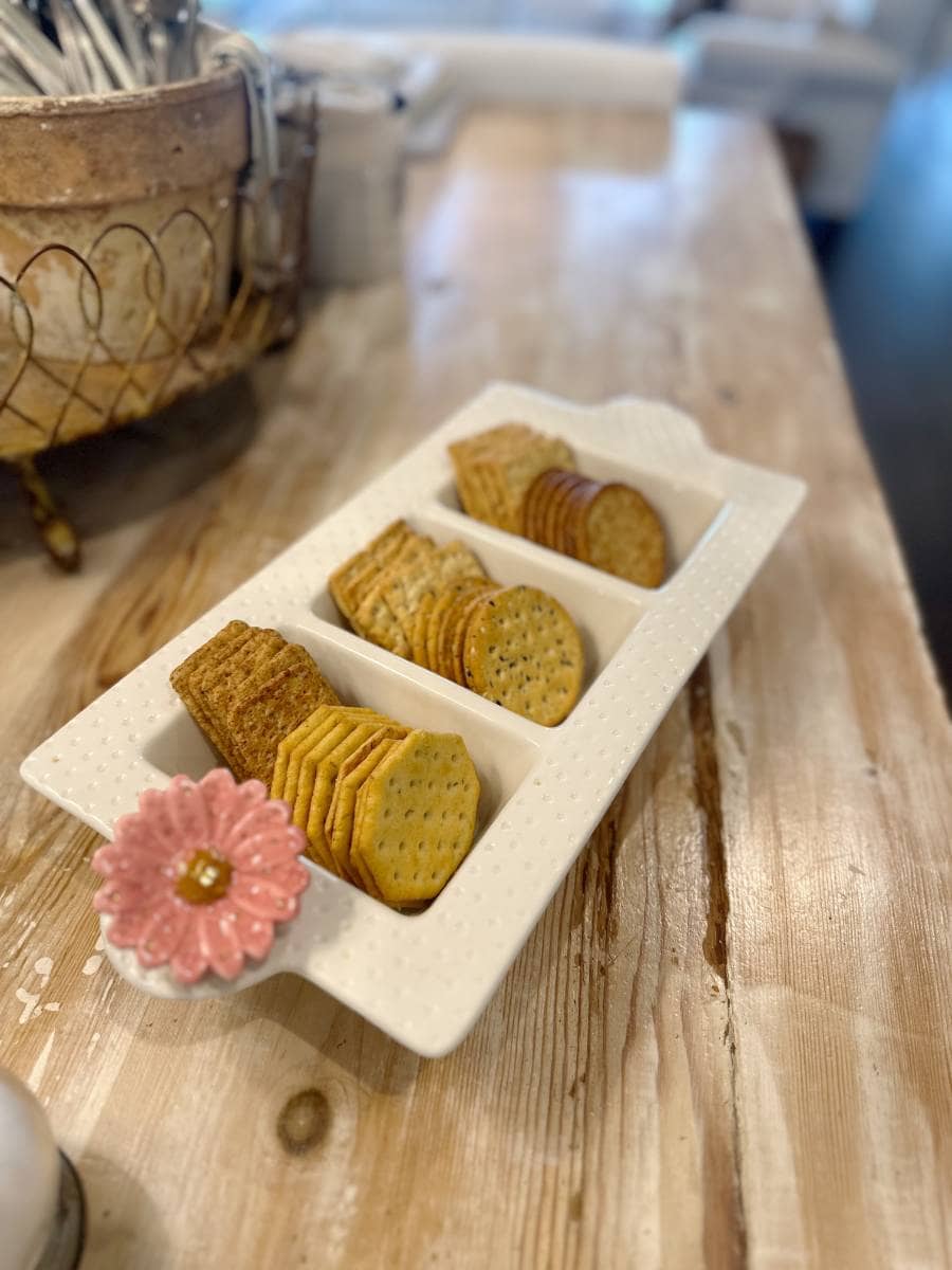 white serving dish with crackers