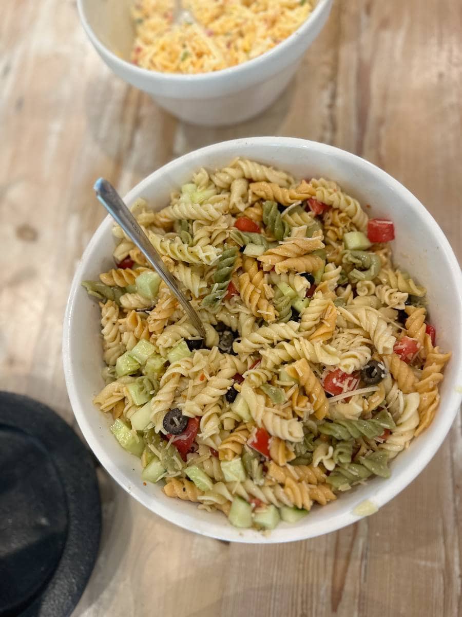 homemade pasta salad in white serving bowl